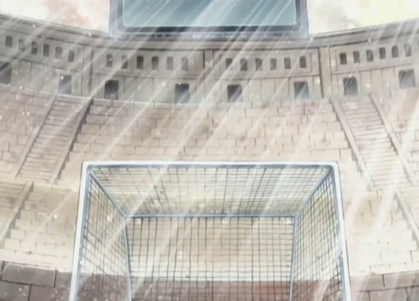 Screenshot of a frame showing a maxi-screen and a football gate on a side of an amphitheatre-like structure